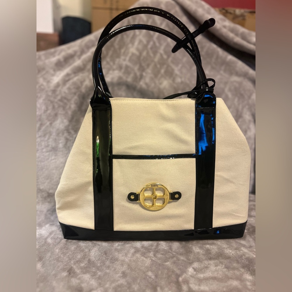 Iman white canvas bag with black patent leather trim